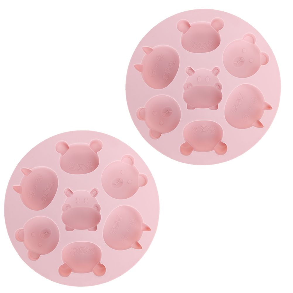 Pink silicone mold with cartoon animal shapes for baking, perfect for cake and chocolate decorations, by Everything Baby.