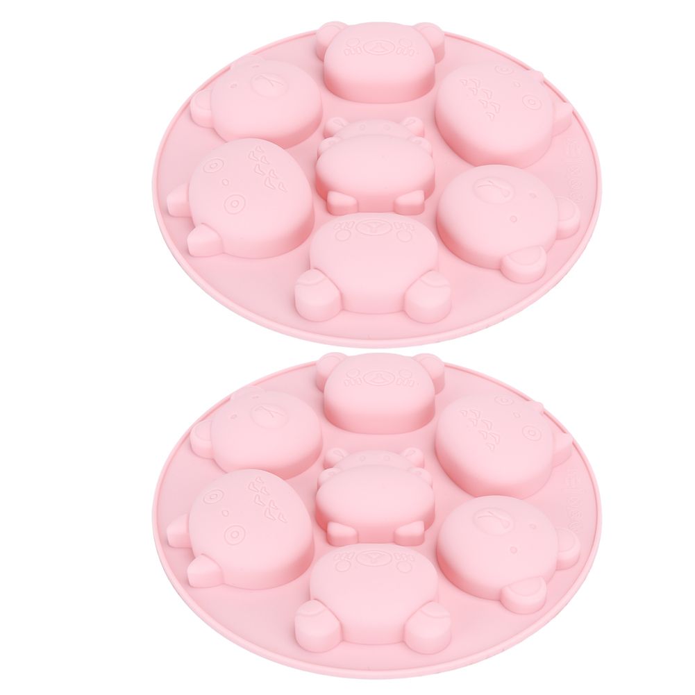 Pink silicone mold with cartoon animal shapes for cake and chocolate baking, ideal for kids' pretend play and baking activities.