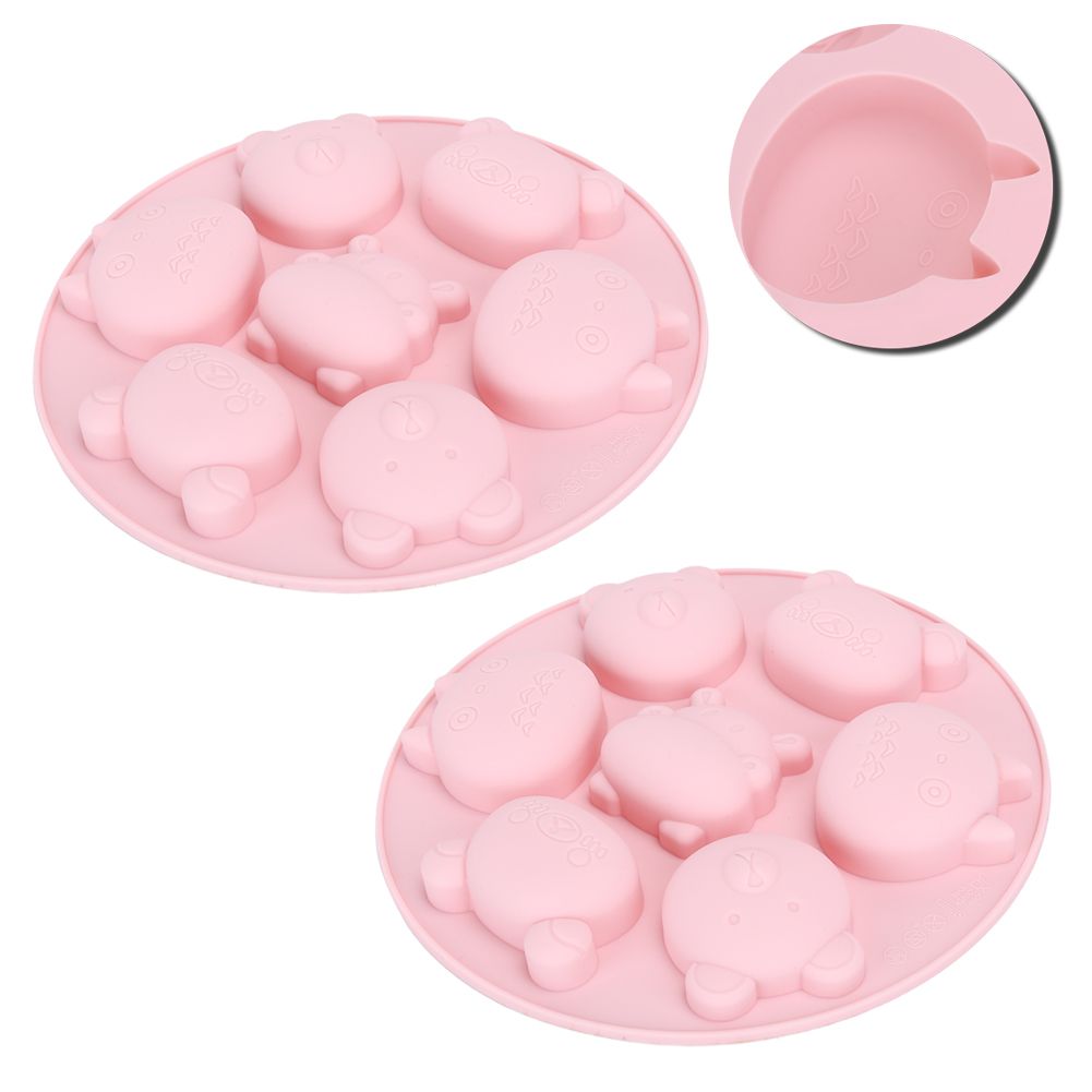 Pink silicone mold with cartoon animal shapes for cake and chocolate baking, perfect for kids' pretend play and kitchen activities.
