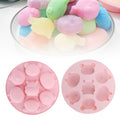 Pink silicone mold with cartoon animal shapes for cake and chocolate baking, ideal for kids' pretend play and baking activities.