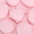 Pink silicone mold featuring cartoon animal shapes for cake, chocolate, and baking, ideal for kids' pretend play baking activities.