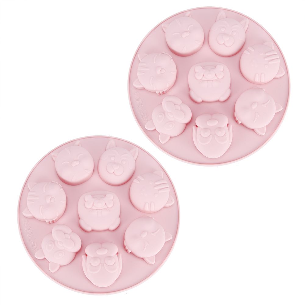 Pink cartoon animal shaped silicone mold for baking and chocolate crafts, ideal for kids' baking and fun kitchen activities.