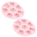 Pink silicone mold with cartoon animal shapes for baking or making chocolates, ideal for kids' treats and baking projects.