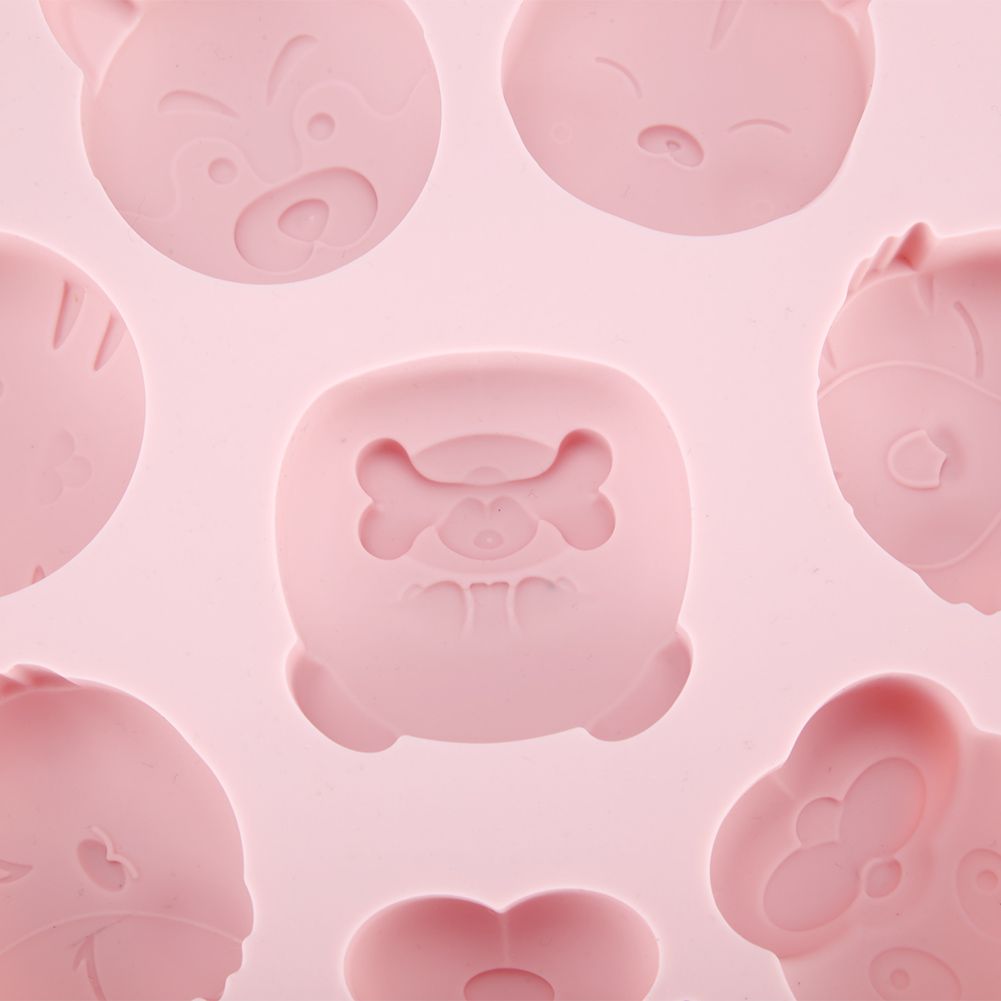 Pink silicone mold with cartoon animal shapes for baking, suitable for cake and chocolate making, ideal for kids' baking projects.