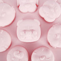 Pink cartoon animal shaped silicone mold for baking and chocolate, ideal for kids’ cake and snack decorations.