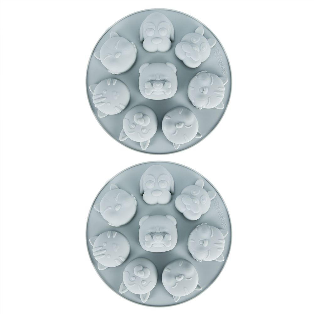Gray silicone mold featuring cartoon animal shapes for baking, chocolate, and cake decorating, ideal for kids' treats.