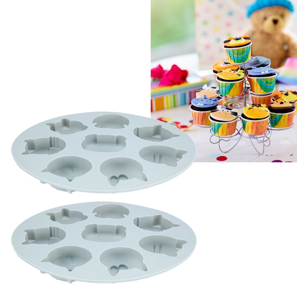 Gray silicone mold featuring cartoon animal shapes for baking, cake decorating, and chocolate making, ideal for kids' treats.