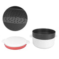 Everything Baby multifunctional round rice steaming box for microwave, used as a kid's pretend play lunch box in a home kitchen.