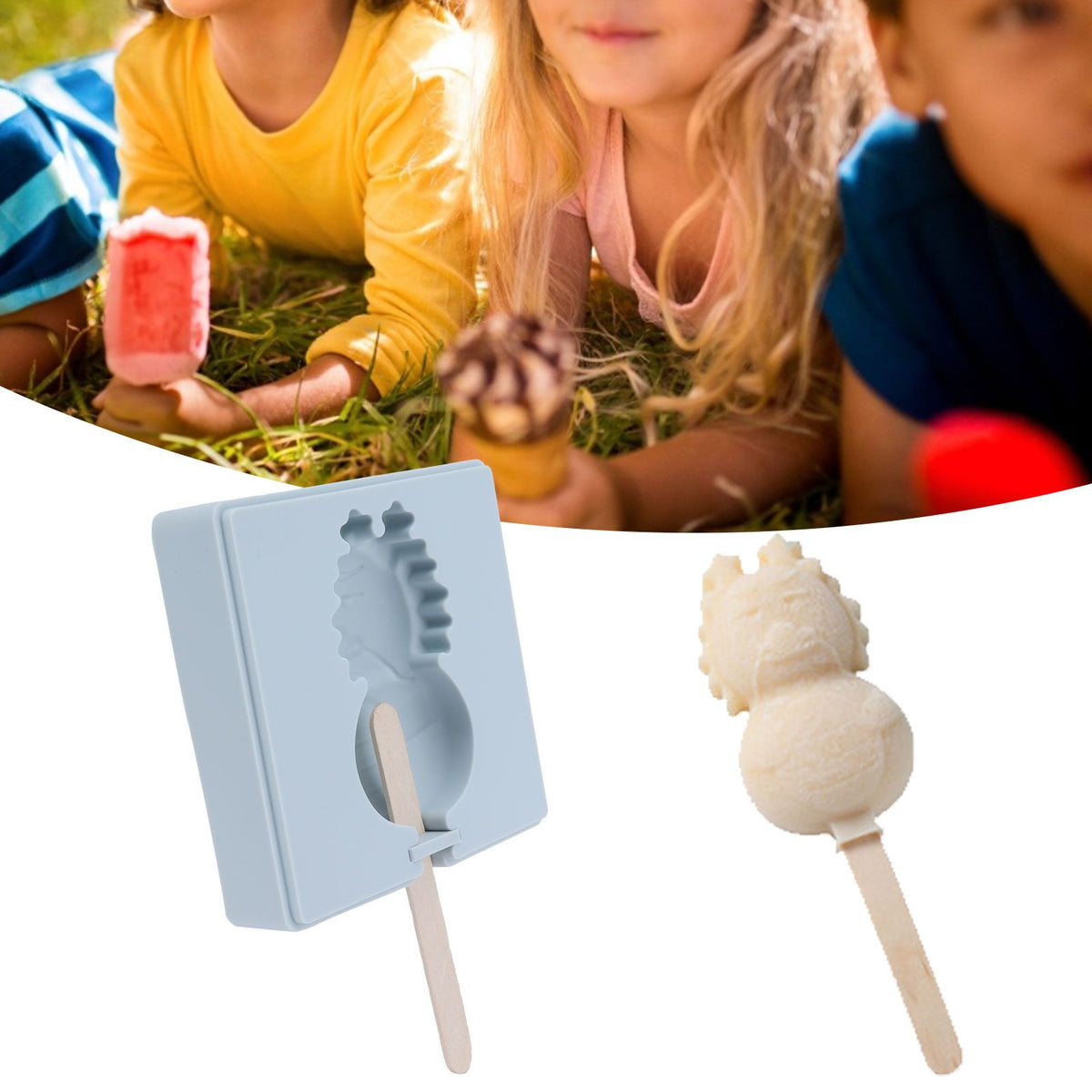 Grey silicone mold with lid and wooden sticks for making cartoon-shaped ice creams, designed for kids' pretend play.