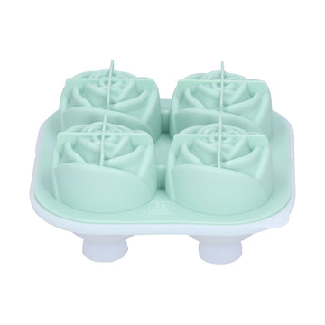 Light green silicone ice cube mold tray with four rose-shaped compartments for making decorative ice cubes at home or bar.