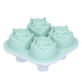 Light green silicone ice cube mold tray in rose shape with four compartments, ideal for home bar and kitchen use.
