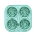 Light green silicone ice cube mold tray with four rose-shaped molds, ideal for home bar and kitchen ice making.