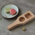 Wooden mooncake mold with two holes, handmade Chinese pastry baking tool for home use, suitable for kids' pretend play.