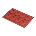 8-hole moon-shaped silicone mold for 3D chocolate cakes, ideal for home bakery and kids' pretend play baking activities.