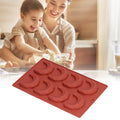 Moon-shaped 8-hole 3D chocolate cake mold for kids' pretend play, ideal for home bakery and kitchen baking activities.