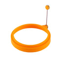Orange silicone round egg ring for easy, reusable frying of eggs and pancakes, ideal for breakfast sandwiches and kids' meals.