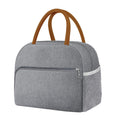 Grey reusable insulated lunch bag for women and men, leakproof thermal food handbag for office, picnics, and outdoor trips.