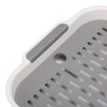 White rectangular plastic baby drying tray with double layer design for drying cups, snacks, and fruit water.