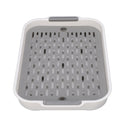 White rectangular plastic double-layer cup drying tray with compartments for fruit, water, cups, and snacks, ideal for baby feeding.