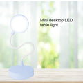 Blue mini desktop LED reading light from Everything Baby, rechargeable night light for kids' desks and bedtime reading.