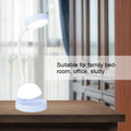 Blue rechargeable LED desk light for kids, compact desktop reading lamp from Everything Baby, ideal for student night and study use.