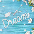 Decorative LED light shaped like a dream for kids' bedroom or playroom, from Everything Baby, ideal for pretend play and room decor.