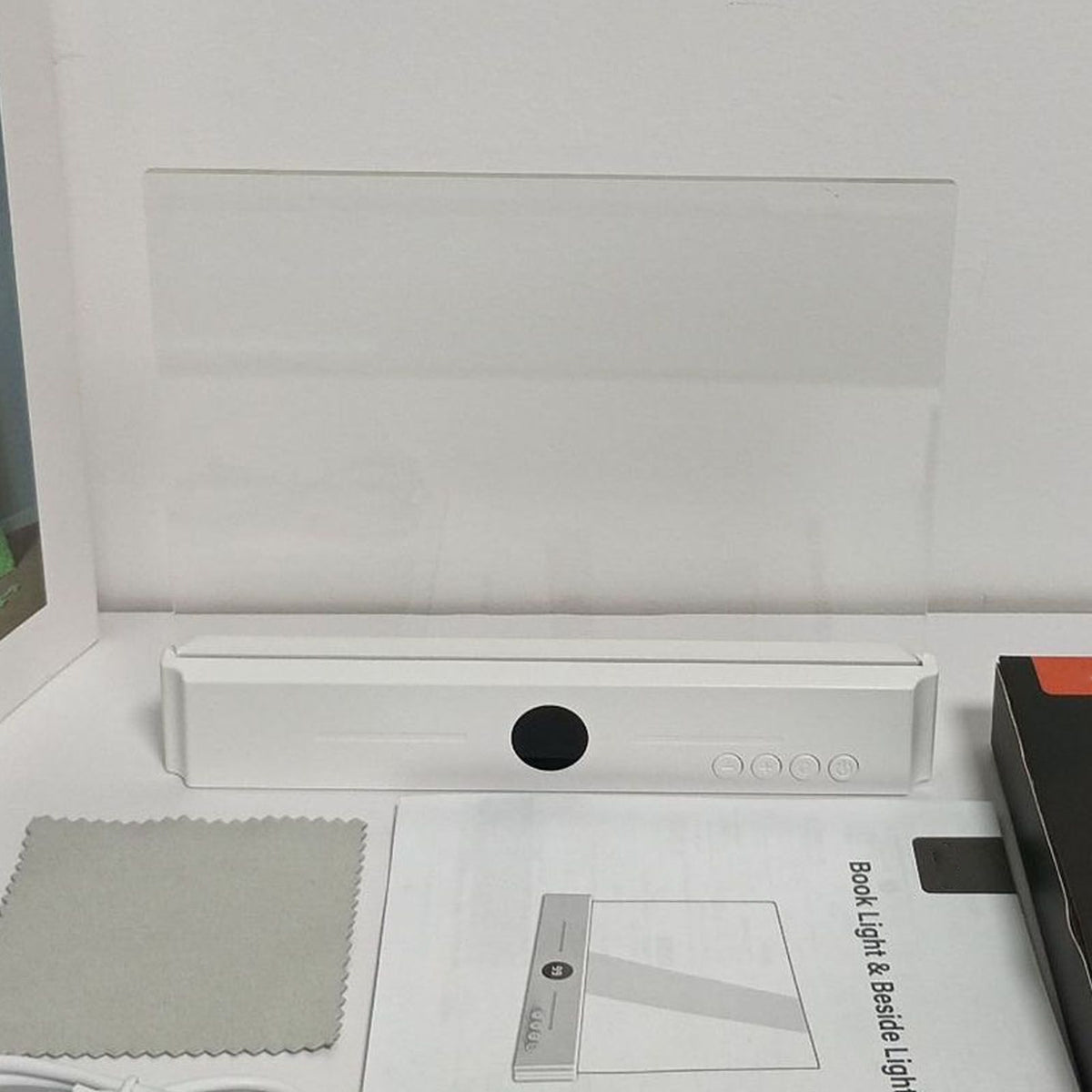 Rechargeable LED flat book light with 3 color options, dimmable, for kids' desks and study areas by Everything Baby.
