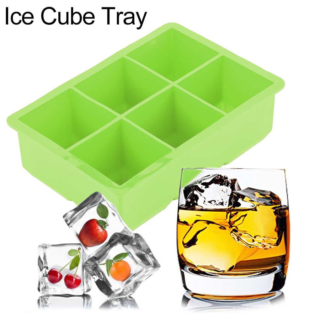 Green silicone ice cube maker with 6 cavities, used for making chocolate or candy molds in kitchen and feeding preparations.