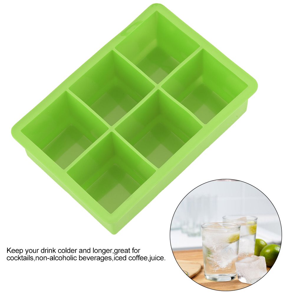 Green silicone ice cube and candy tray mold with 6 cavities, ideal for kitchen and baby feeding preparation.