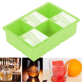 Green silicone ice cube maker with six cavities, ideal for making chocolate or candy molds in the kitchen.