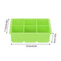Green silicone ice cube and candy mold with 6 cavities, ideal for making chocolates and ice cubes in the kitchen.
