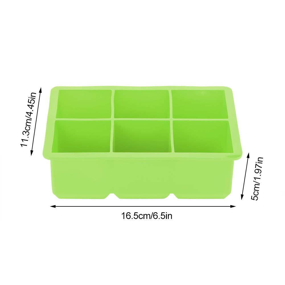 Green silicone ice cube and candy mold with 6 cavities, ideal for making chocolates and ice cubes in the kitchen.