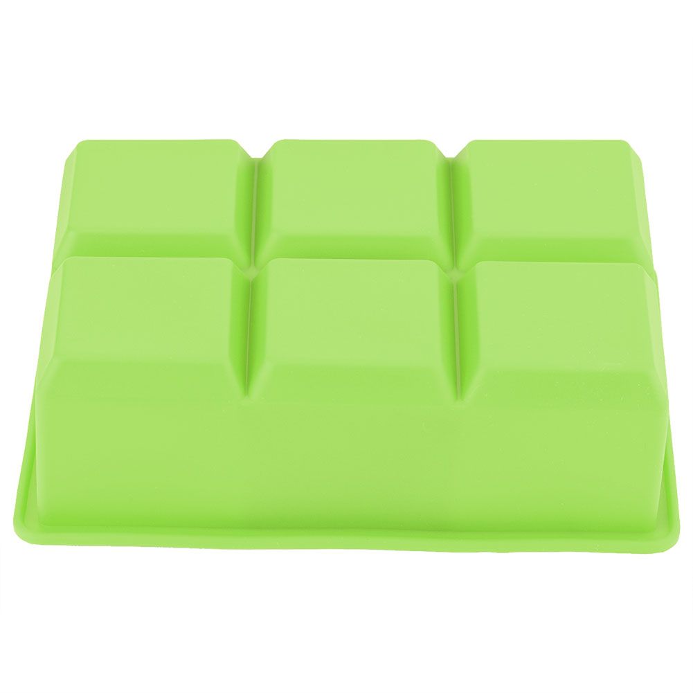 Green silicone ice cube maker with 6 cavities, ideal for making chocolates and candies, suitable for kitchen and cooking use.