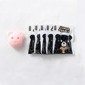 Pink mini bear-shaped hand warmer by Everything Baby, automatic heating, perfect for girls' winter sleepwear and cozy warmth.