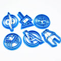 Silicone cake mold featuring Avengers pattern with conch, starfish, shell, and fishtail designs for baking and decorating cakes.