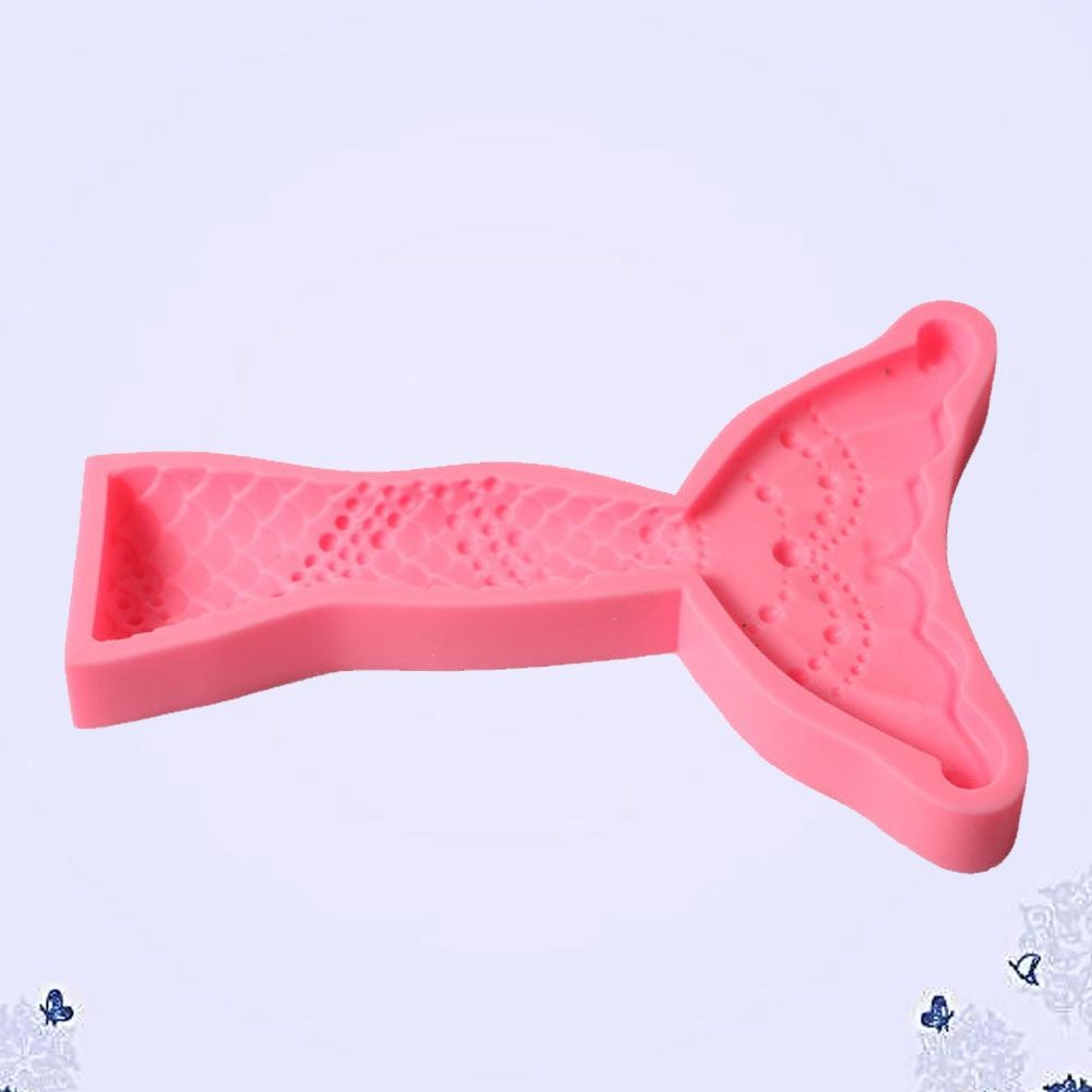 Silicone cake mold in marine shapes including conch, starfish, shell, and fishtail from Everything Baby Marine Series for baking.