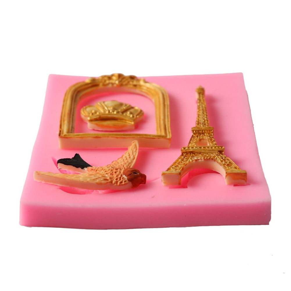 Silicone mold shaped like a baby cage tower for cake and cookie decorating, ideal for baking and pretend play food activities.