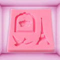 Silicone mold shaped like a baby cage tower for cake decorating and baking, used for creating themed sweets and treats.