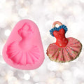 Silicone mold with dress shape for cake, cookie, and sugar paste decorating, ideal for baking and pretend play with kids.