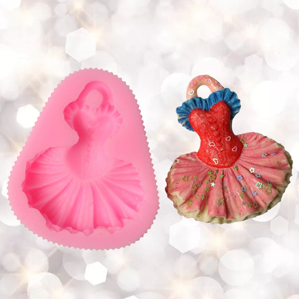 Silicone mold with dress shape for cake, cookie, and sugar paste decorating, ideal for baking and pretend play with kids.