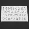 Gray silicone mold with letter shapes for cake decorating and fondant, ideal for baby and kids themed baking and feeding projects.