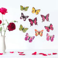 Set of 10 glowing butterfly wall decals for kids' rooms, luminous glow-in-the-dark stickers for children's pretend play decor.