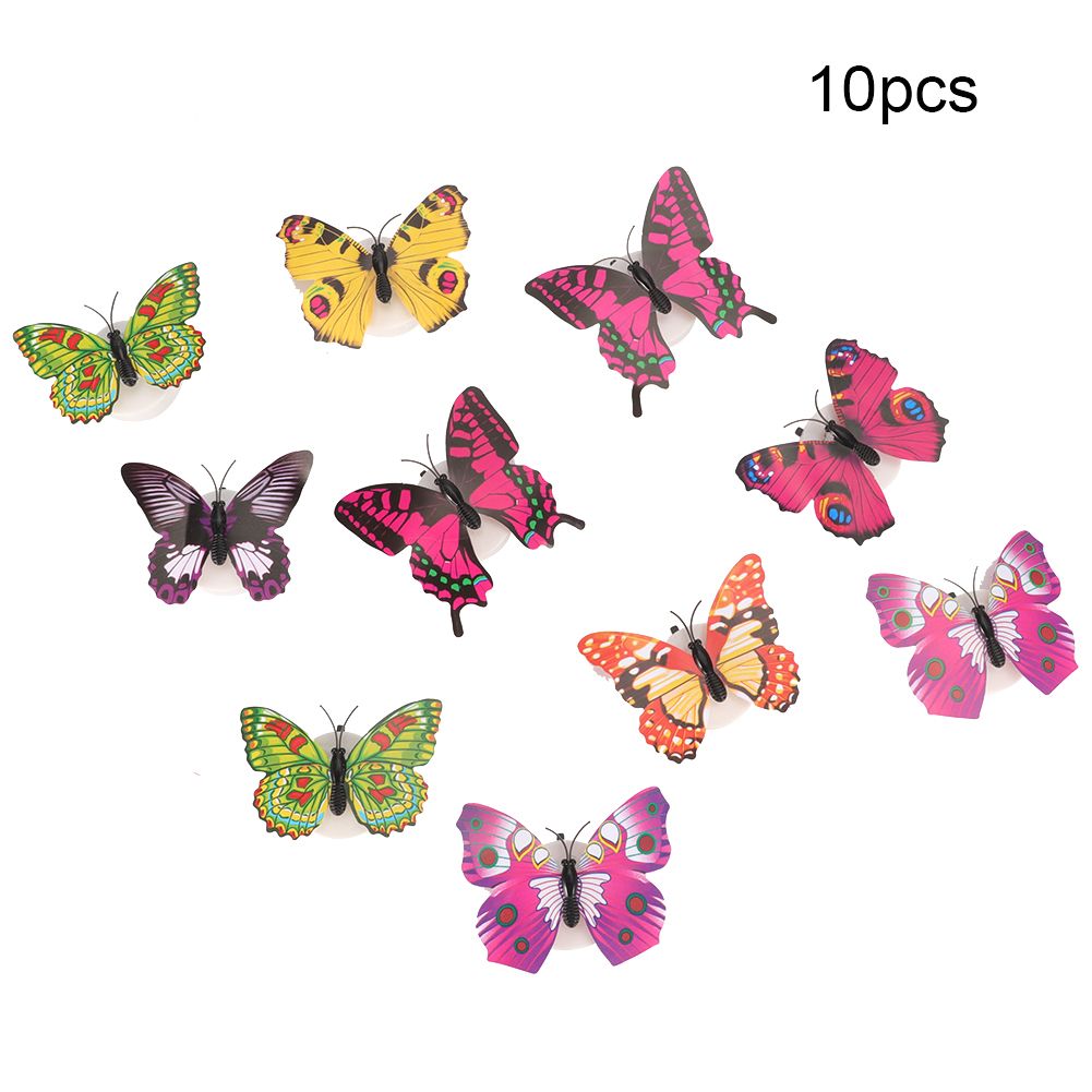 10 glowing butterfly wall decals from Everything Baby, luminous and glow-in-the-dark, perfect for children's pretend play room decor.