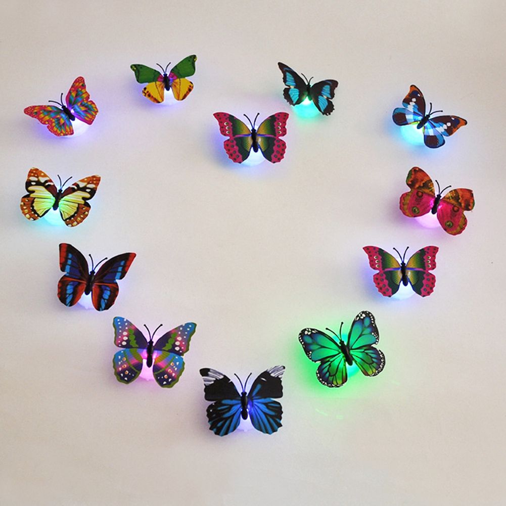 Set of 10 luminous butterfly wall decals for children’s rooms, glow-in-the-dark stickers for DIY decoration and pretend play.