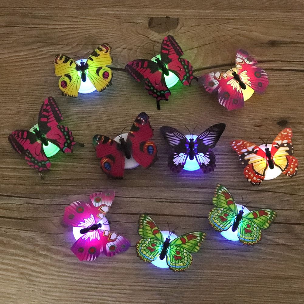 10 glowing butterfly luminous wall decals for children’s room, glow in the dark, perfect for kids' pretend play and room decor.