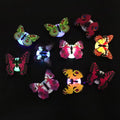 Set of 10 glowing butterfly luminous wall decals for children's rooms, perfect for pretend play and decorating walls.