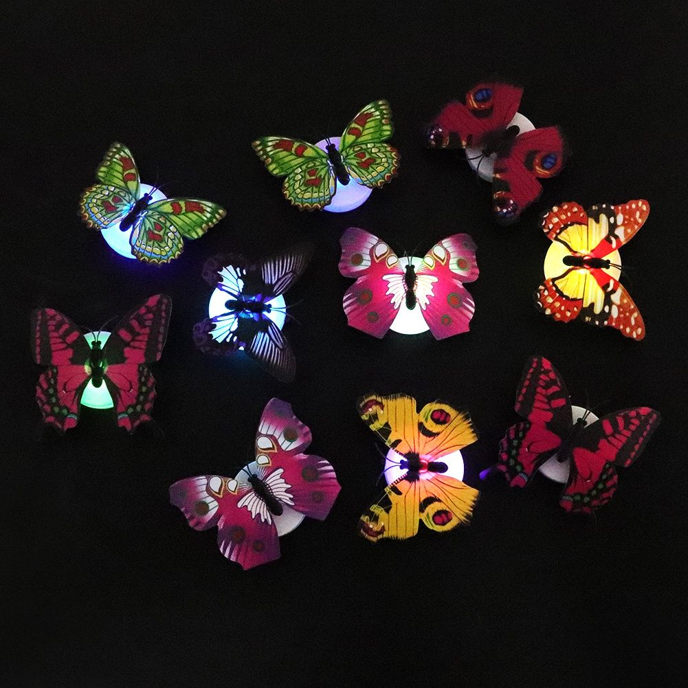 Set of 10 glowing butterfly luminous wall decals for children's rooms, perfect for pretend play and decorating walls.
