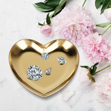 Gold stainless steel heart-shaped plate tea tray with compartments, used as a fruit tray or jewelry organizer for baby and kids nursing.