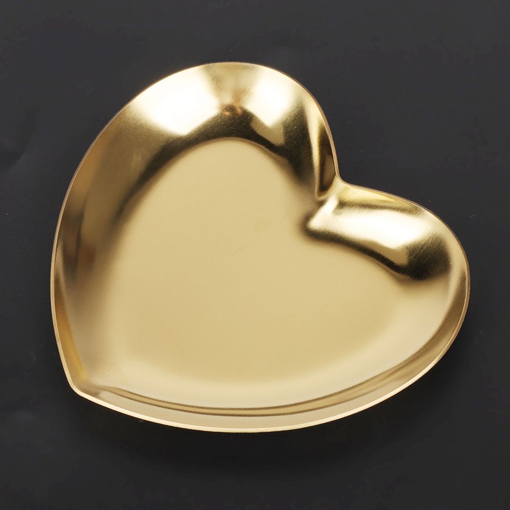 Gold stainless steel heart-shaped tray with compartments, used as a tea tray, fruit tray, or jewelry organizer, suitable for nursery use.