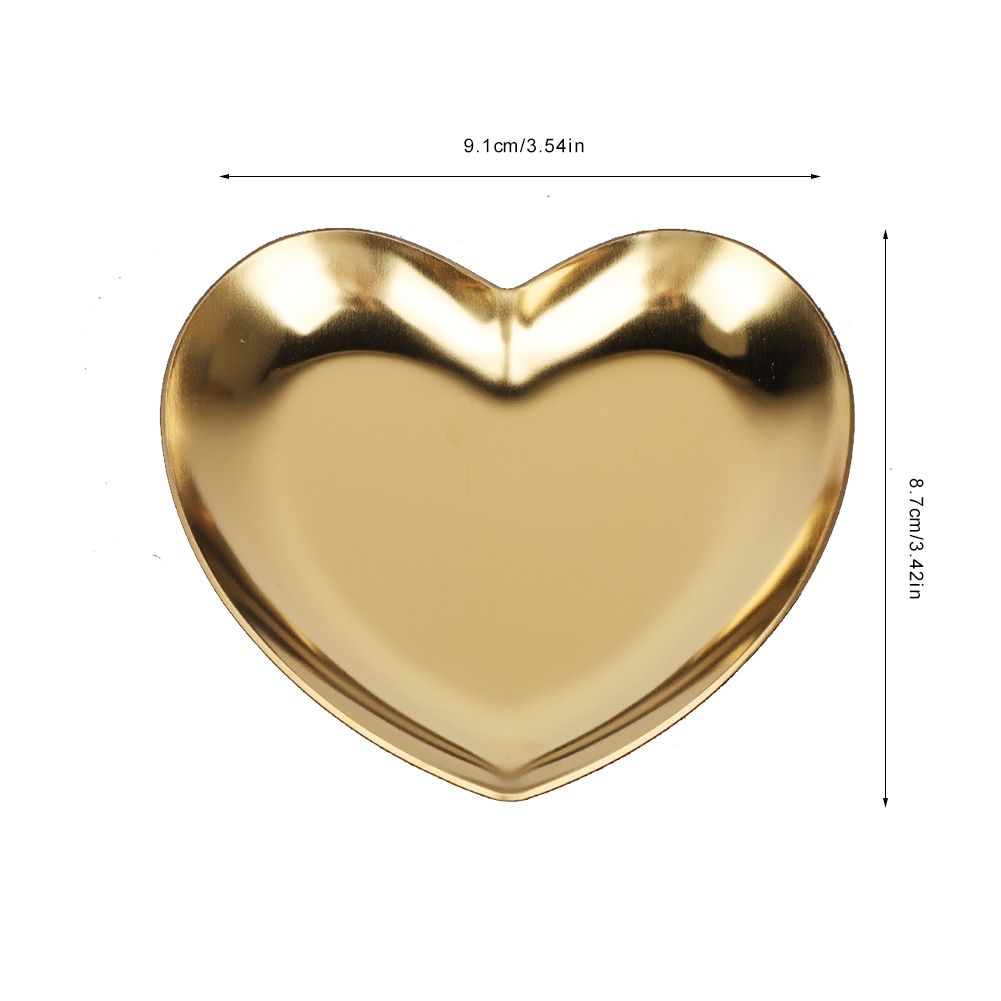 Gold stainless steel heart-shaped tray with compartments for jewelry, cosmetics, or fruit, ideal for organizing and serving.